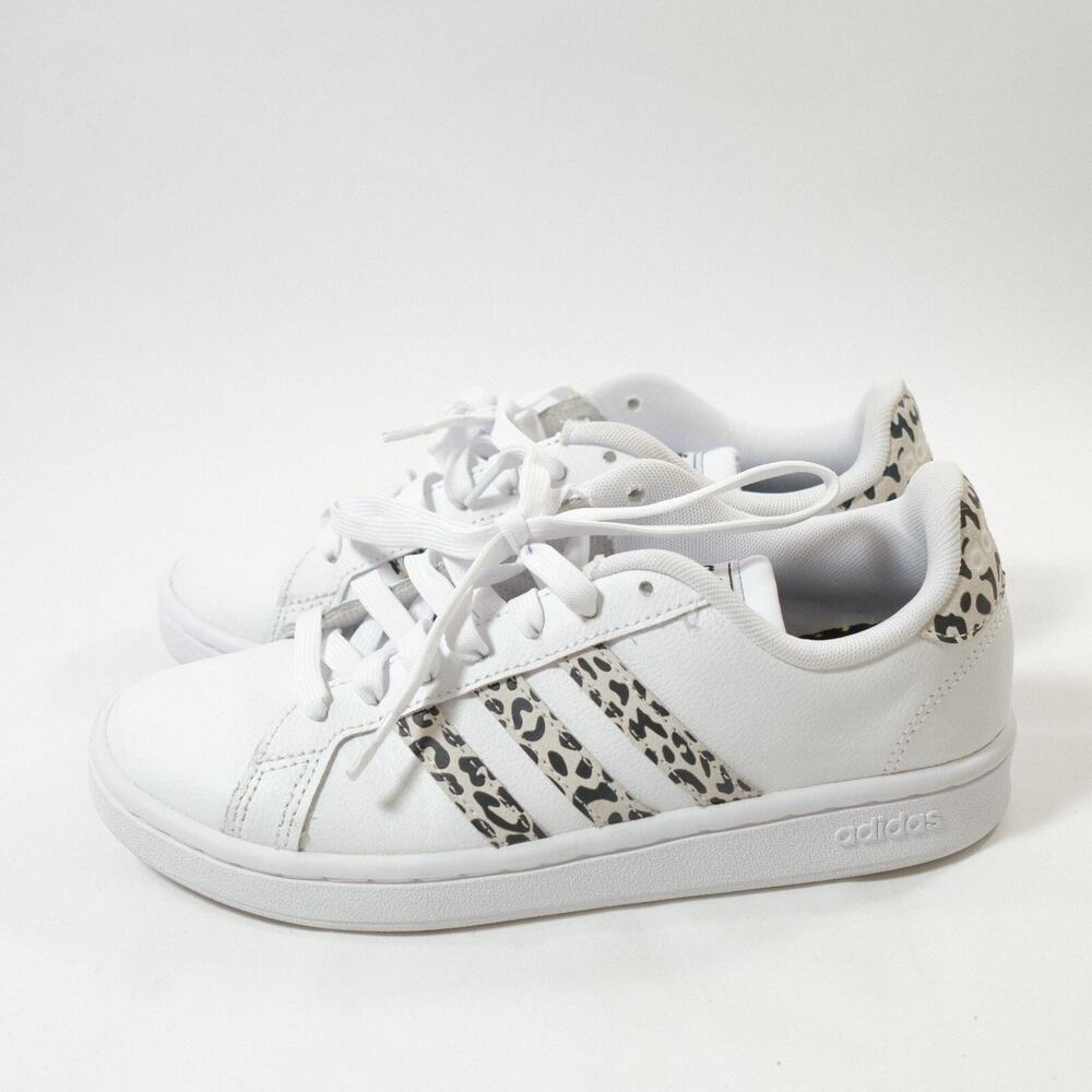 Women’s 7 Adidas Grand Court Sneakers with leopard print stripes.